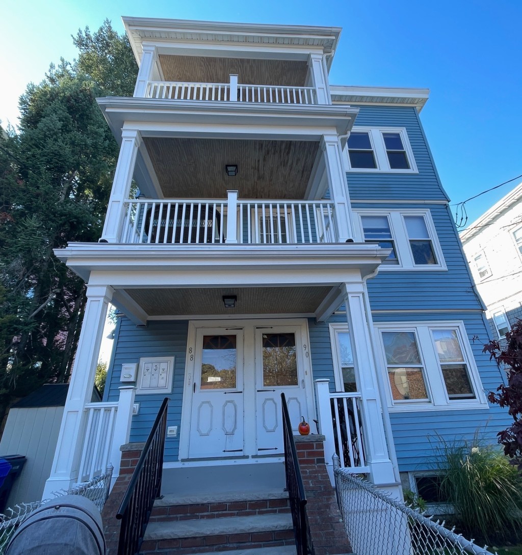 Brighton thriple decker is an iconic housing building in boston